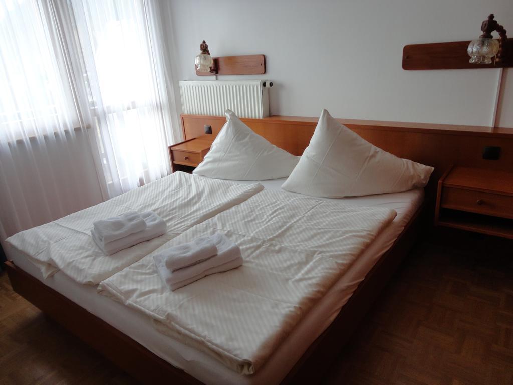 Panoramablickhotel - Lakeview Apartments Annenheim Pokoj fotografie
